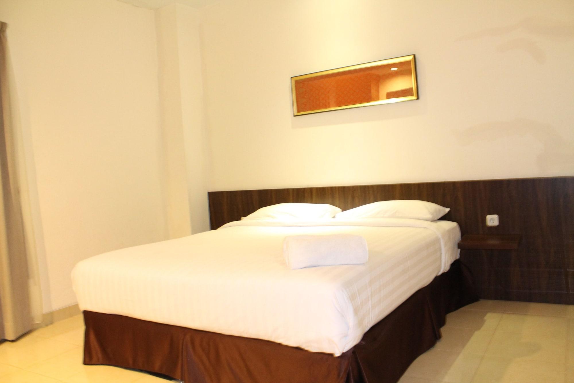 Ameera Hotel Pekanbaru Buitenkant foto