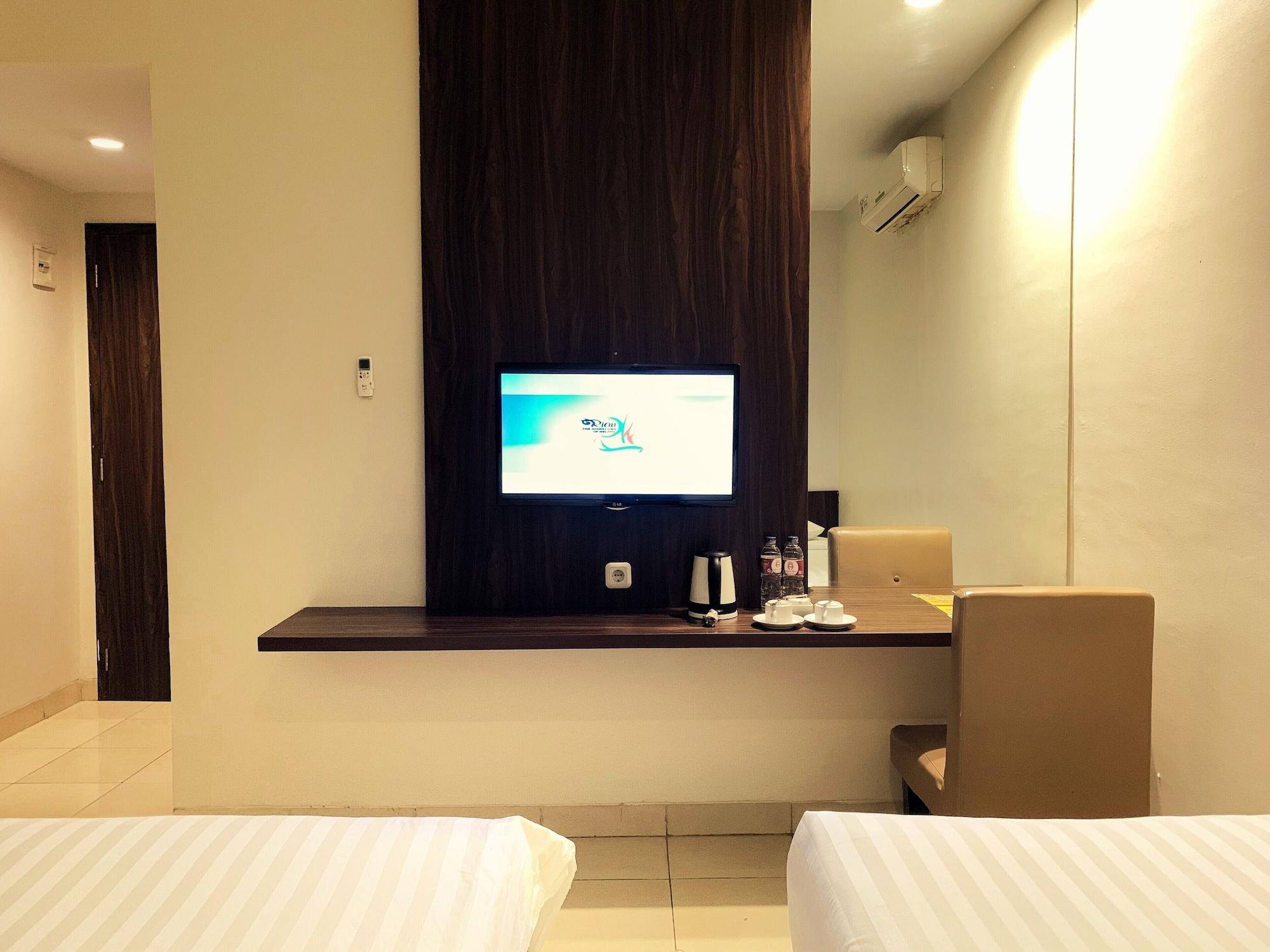 Ameera Hotel Pekanbaru Buitenkant foto