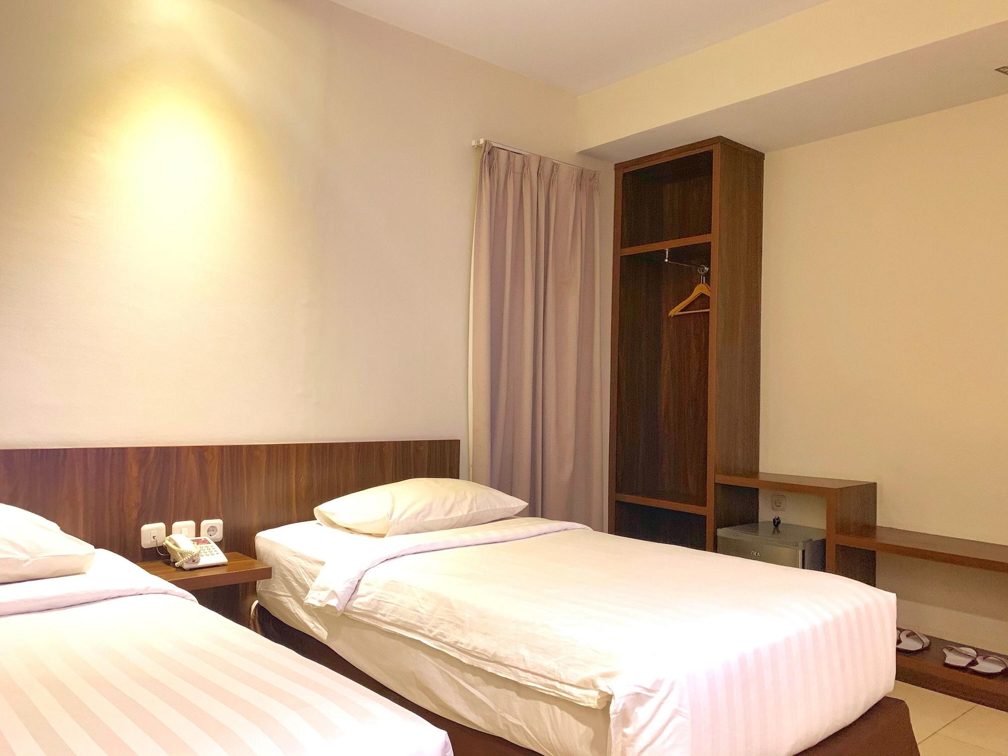 Ameera Hotel Pekanbaru Buitenkant foto