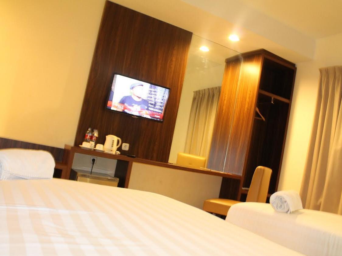 Ameera Hotel Pekanbaru Buitenkant foto
